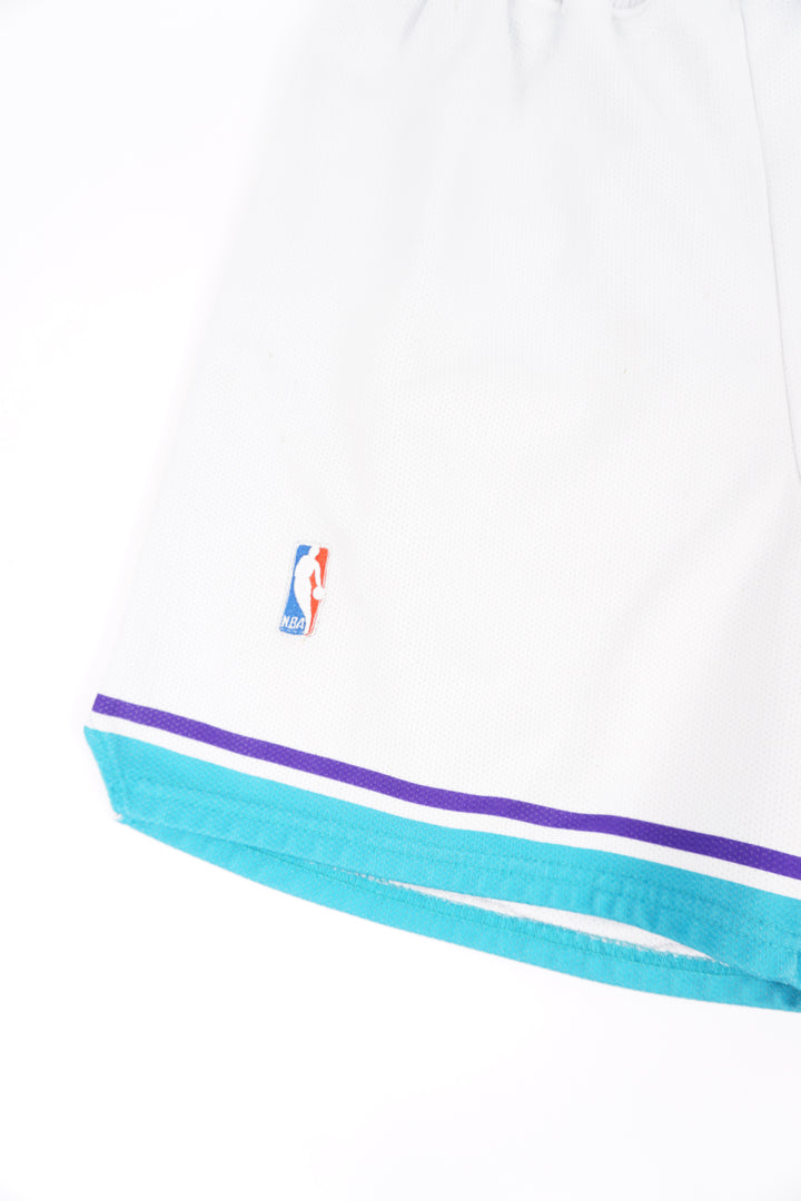 Vintage 90s Charlotte Hornets Champion basketball shorts with embroidered details