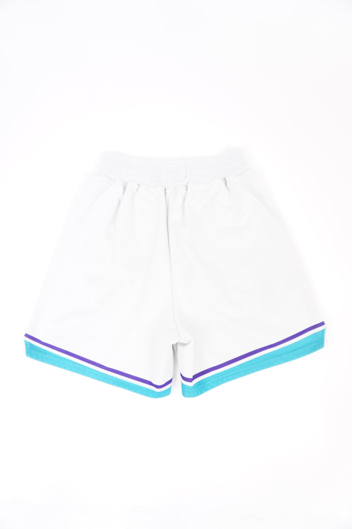 Vintage 90s Charlotte Hornets Champion basketball shorts with embroidered details