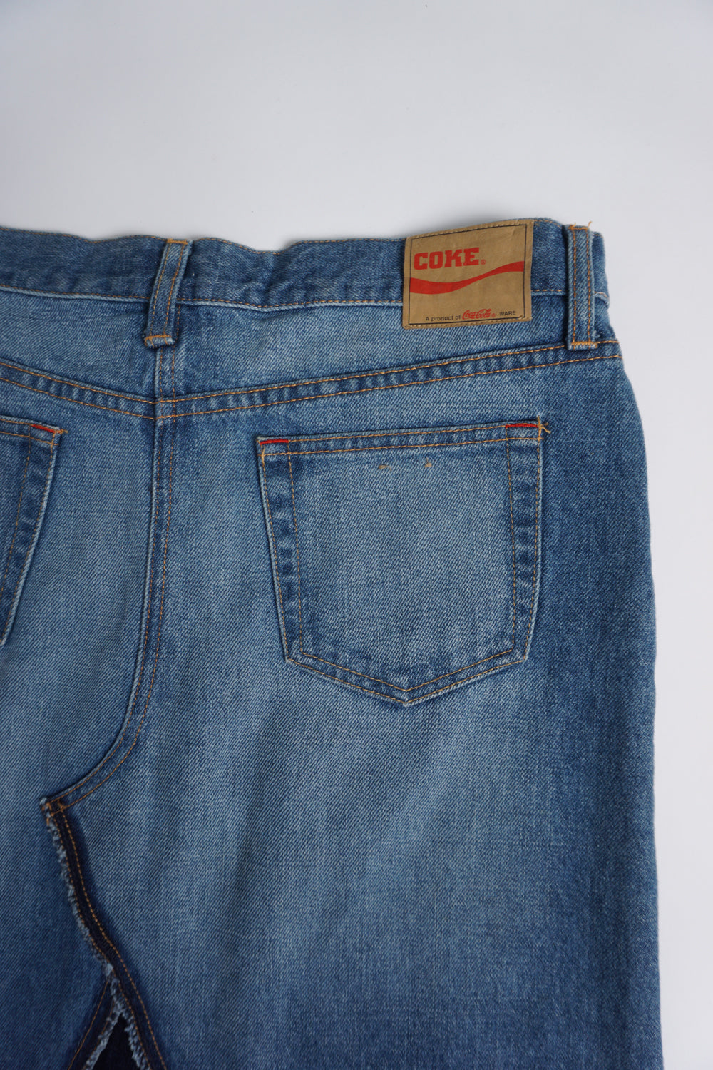 Vintage Coca-Cola blue denim maxi skirt with raw hem and slit in the front 