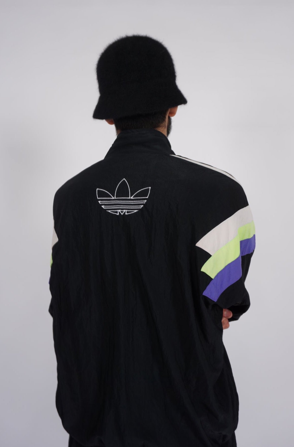 Black Adidas zip through belted one piece ski suit, with embroidered logo on the front and back