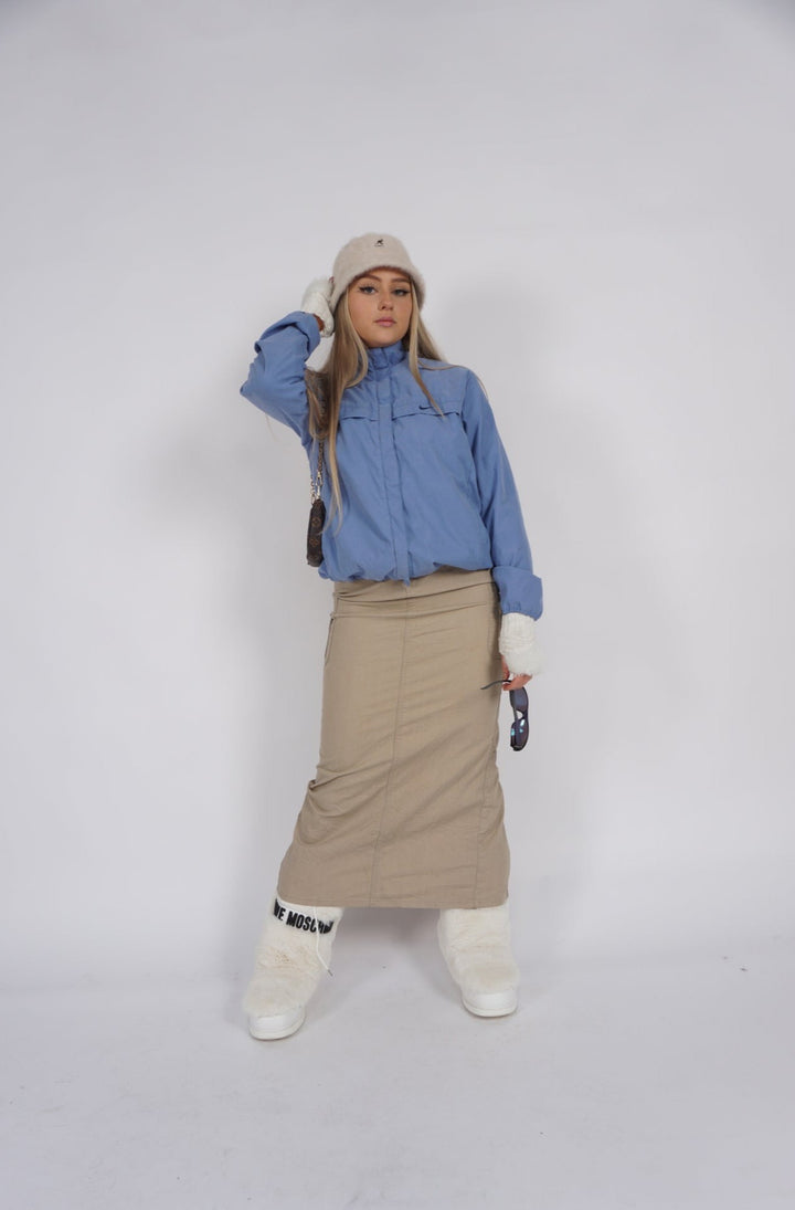 Vintage Y2k style tan cargo maxi skirt with zip up pockets on the side Vintage Y2k style tan cargo maxi skirt with zip up pockets on the side   good condition- faint mark on the front (see photos)  Size in Label:  10 (S)