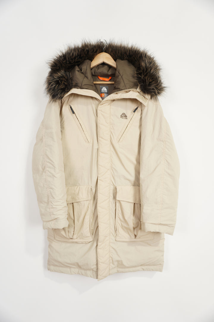 Nike ACG zip through coat with high neck, pockets and faux fur on collar