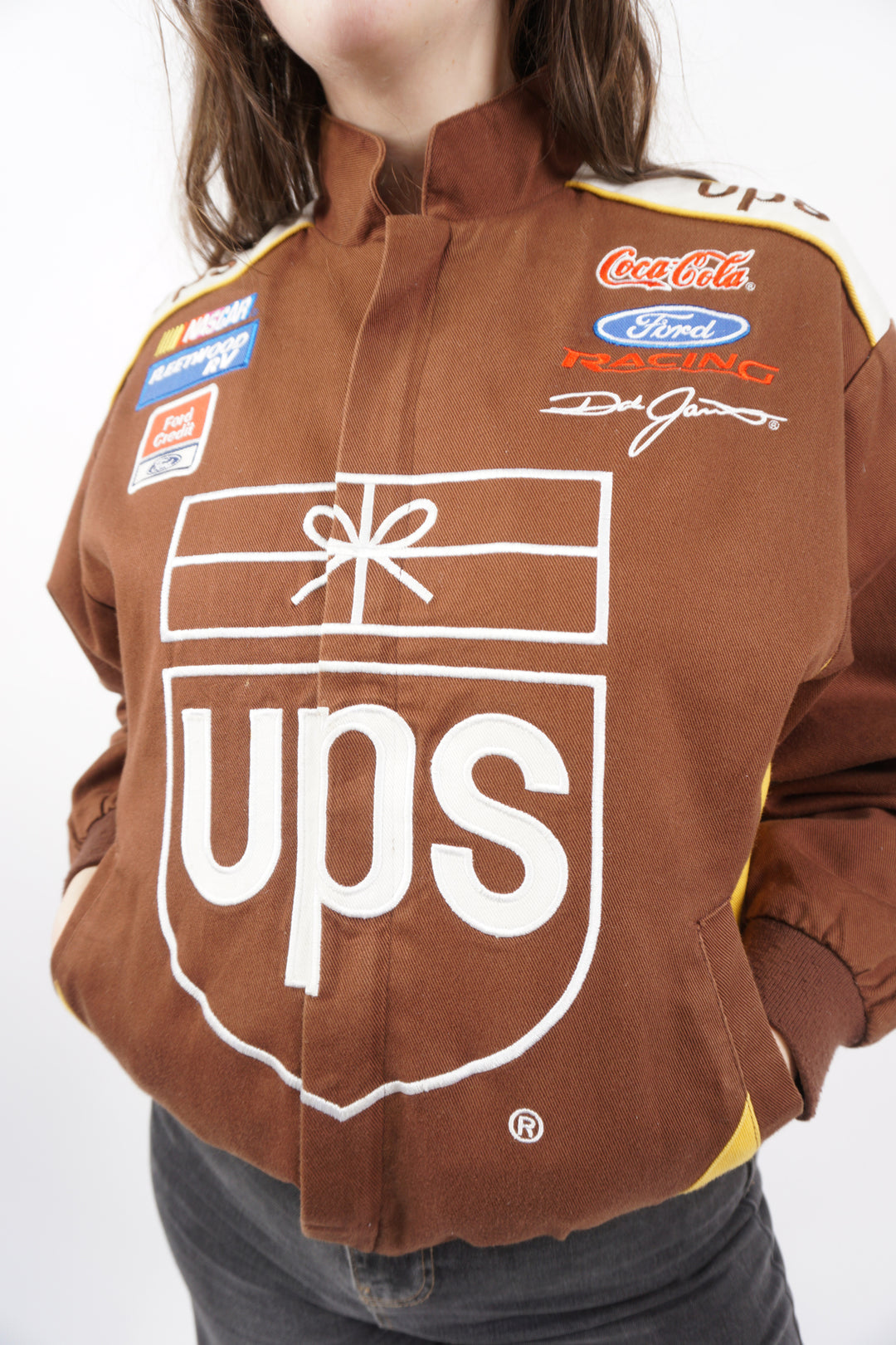 Vintage 90s Women's brown cotton UPS Nascar jacket by Chase Authentics. With embroidered details and sponsors all over