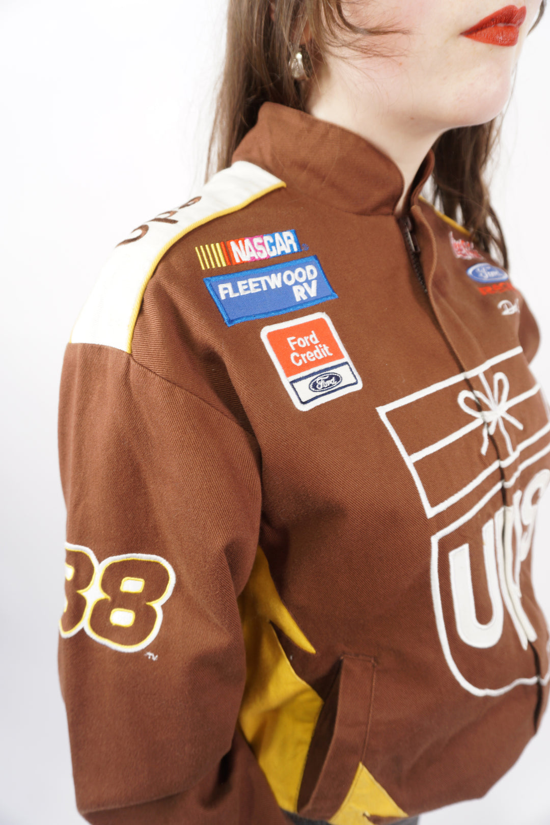 Vintage 90s Women's brown cotton UPS Nascar jacket by Chase Authentics. With embroidered details and sponsors all over