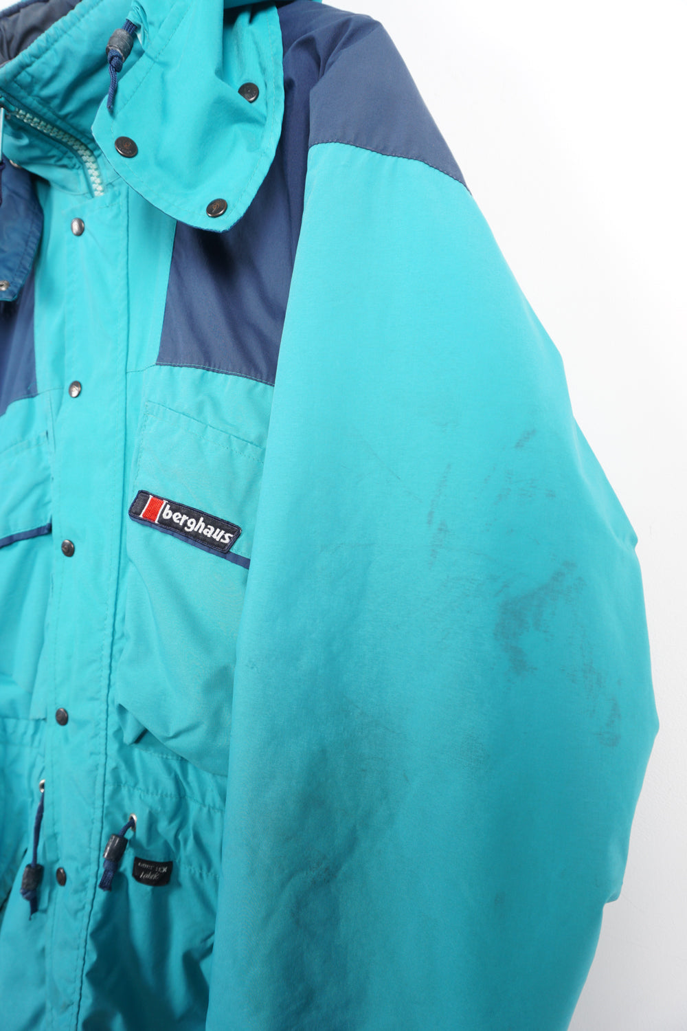 Vintage turquoise Berghaus, zip through Gortex waterproof, insulated coat with removable hood and embroidered logo on the chest