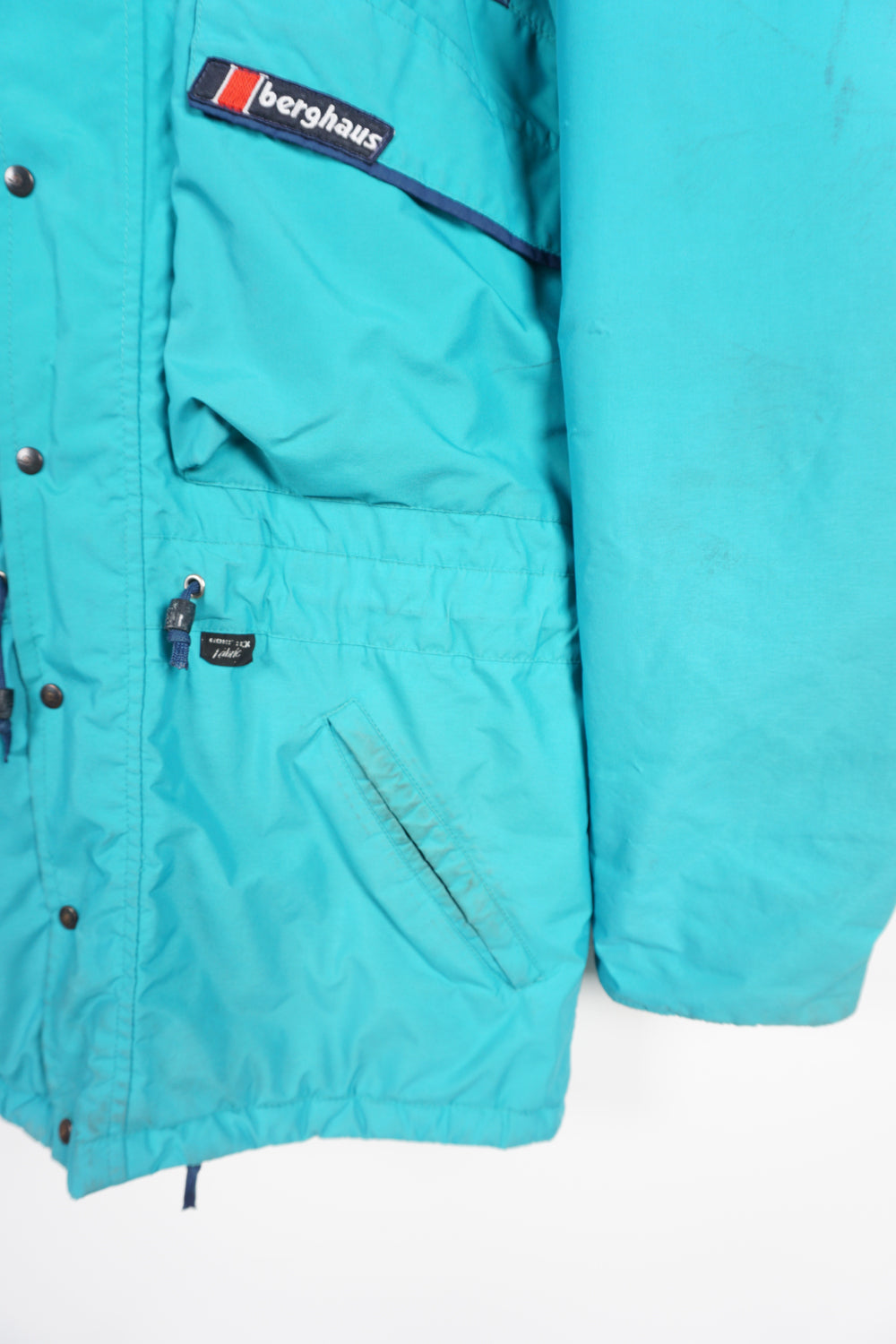 Vintage turquoise Berghaus, zip through Gortex waterproof, insulated coat with removable hood and embroidered logo on the chest