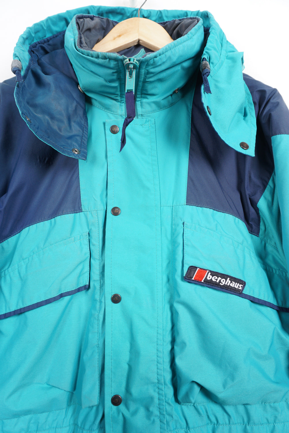 Vintage turquoise Berghaus, zip through Gortex waterproof, insulated coat with removable hood and embroidered logo on the chest