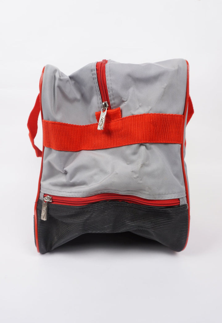 Vintage red and grey Nike spell-out duffle bag