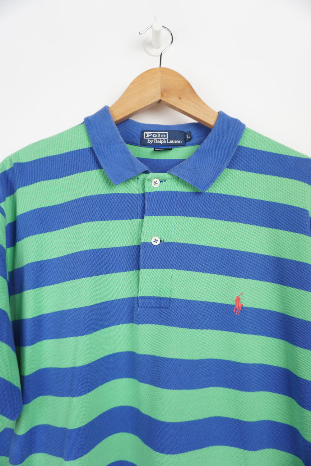 Vintage Ralph Lauren blue and green striped polo shirt embroidered logo. good condition Size in Label: L Our Measurements: Chest: 23 inchesLength: 33 inches Please ensure you check all measurements. ** All our items are pre-loved and as a result may show signs of wear due to the age of the product, for any questions about this or any other item please email hello@vintage-folk.com **