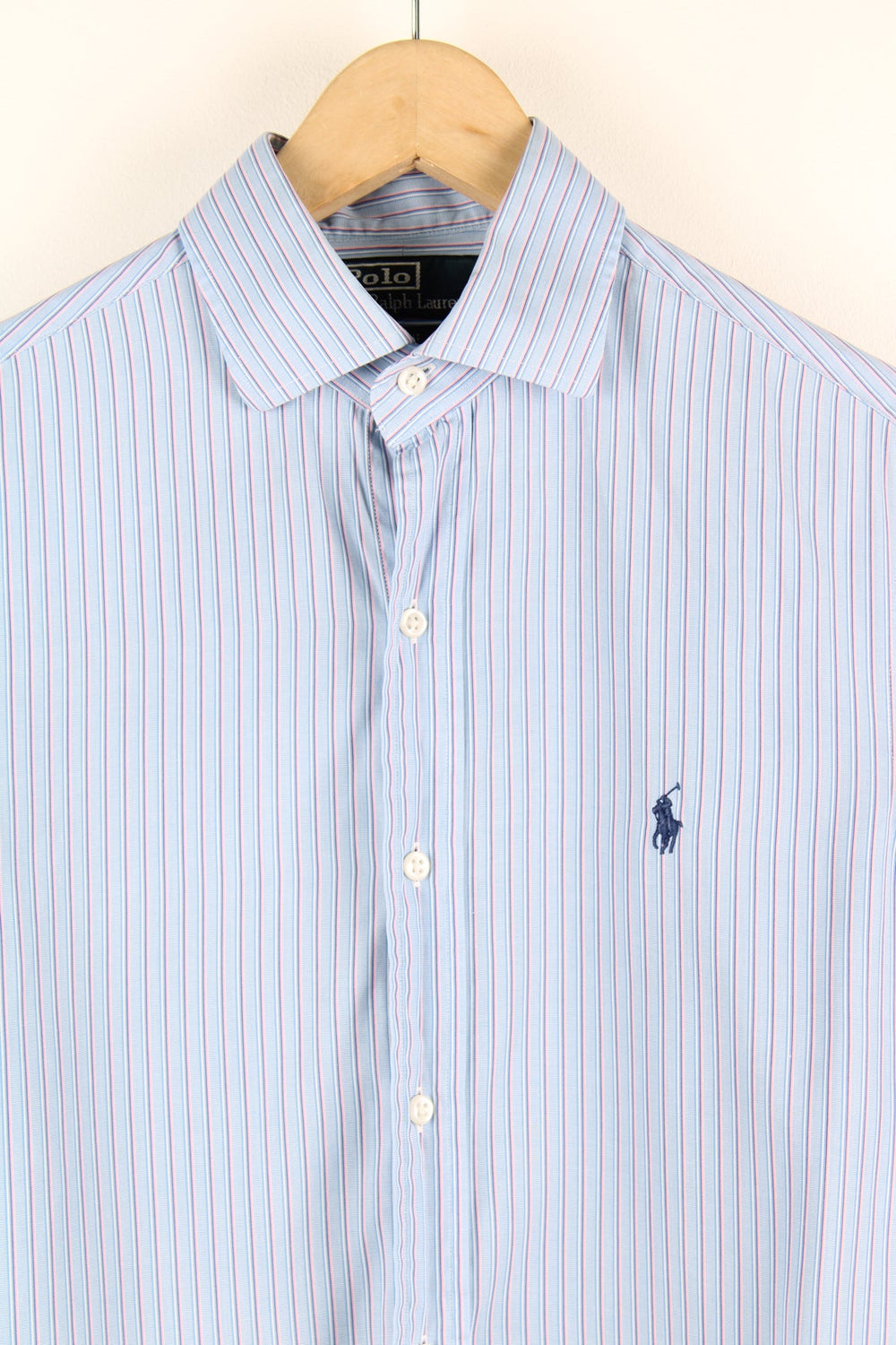 Ralph Lauren blue and pink pinstripe button up shirt with signature embroidered logo on the chest.