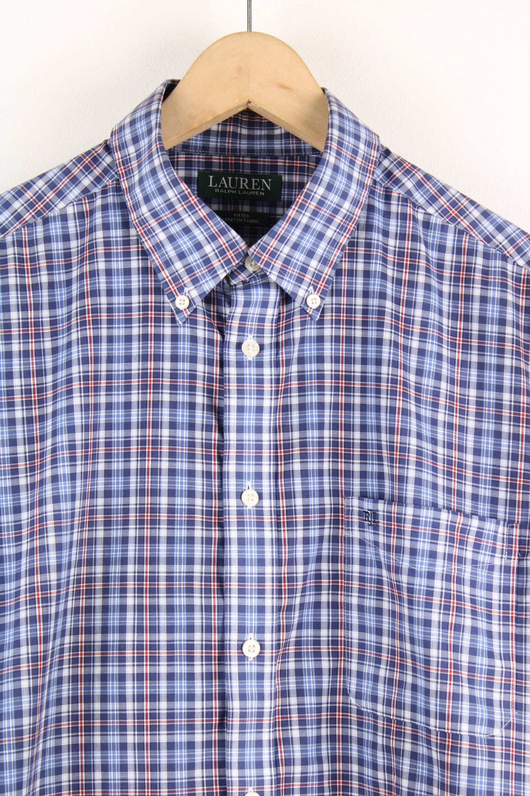 Ralph Lauren blue and red button up plaid shirt. Features pocket on the chest with an embroidered logo.