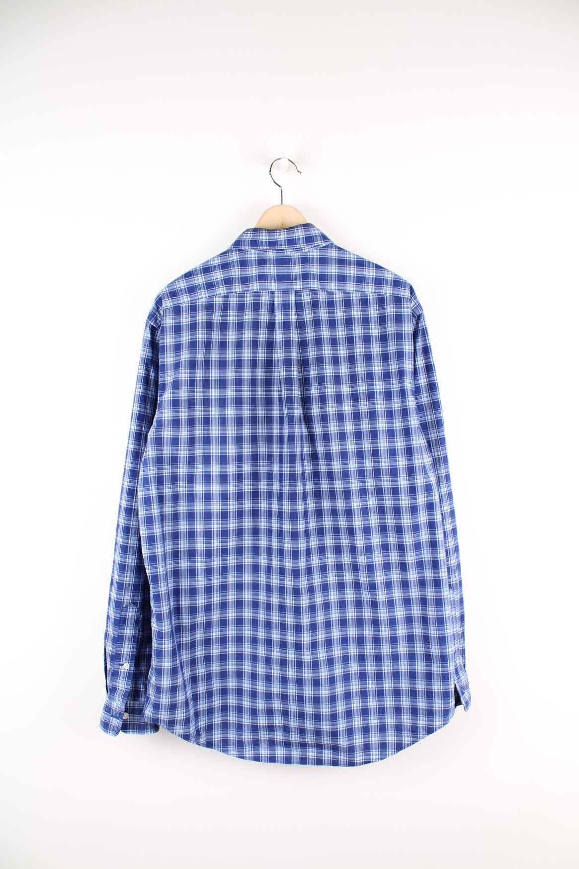 Ralph Lauren blue button up plaid shirt with signature embroidered logo on the chest.