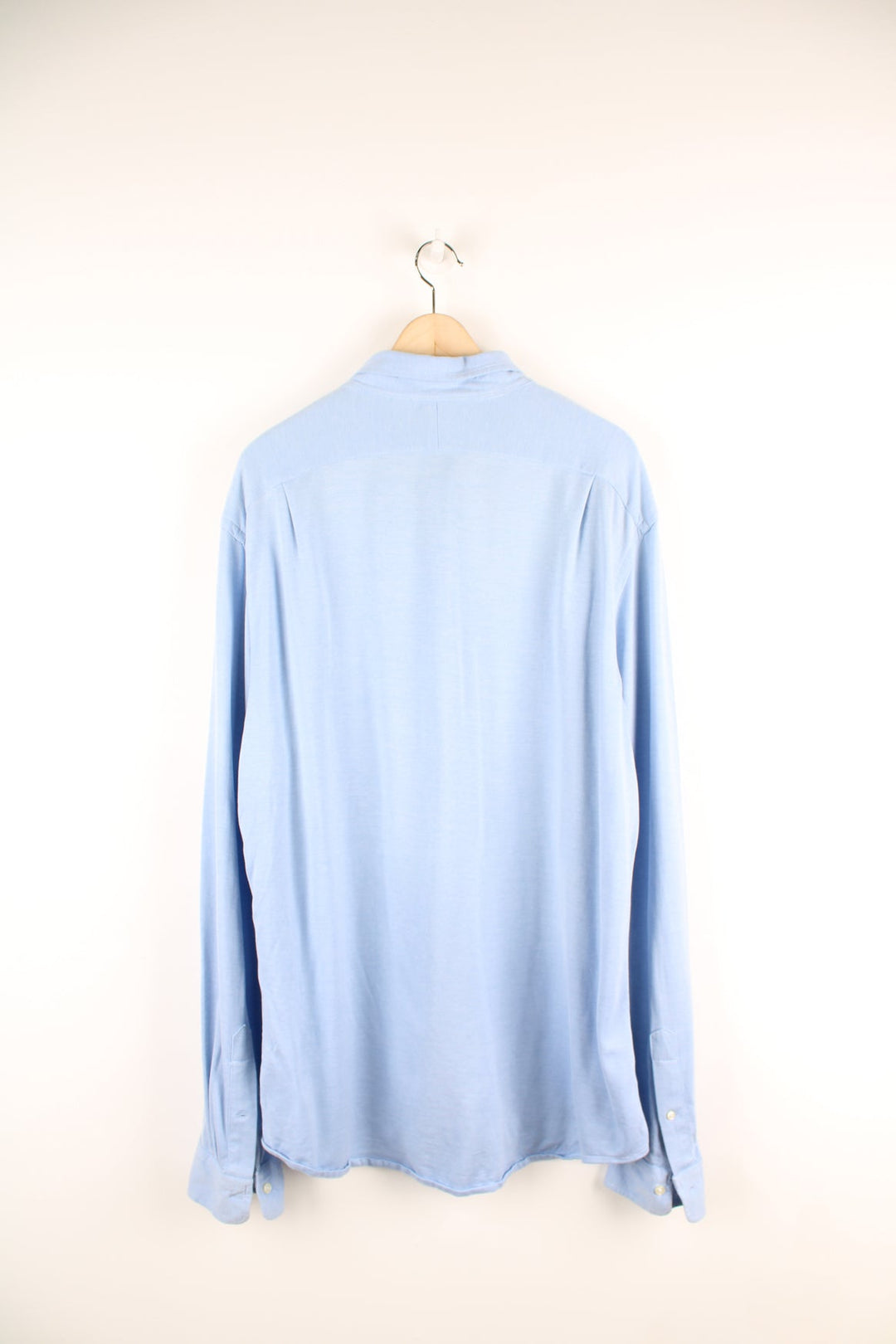 Ralph Lauren blue knit dress button up shirt with embroidered logo on the chest.