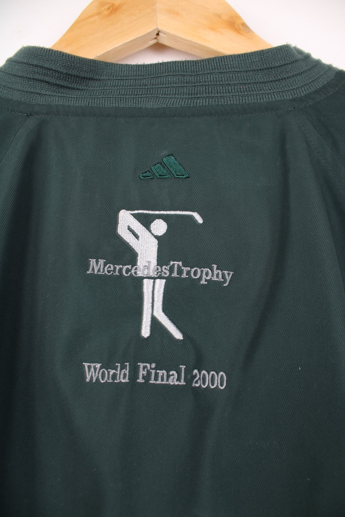 Adidas Golf Mercedes Trophy World Final 2000 pullover nylon windbreaker. Features embroidered logo.