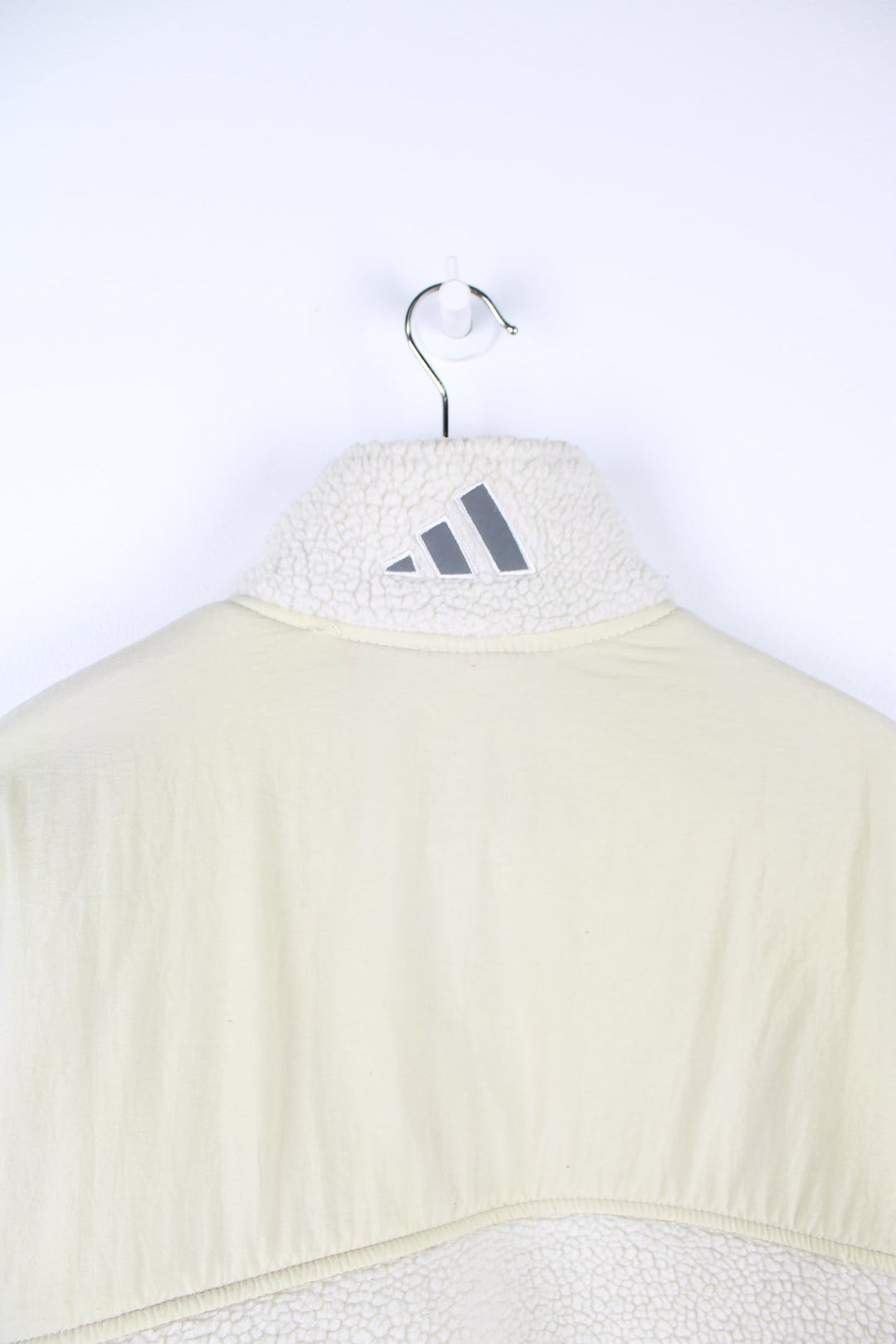 Beige Adidas pullover sherpa fleece with quarter zip and pouch pocket.