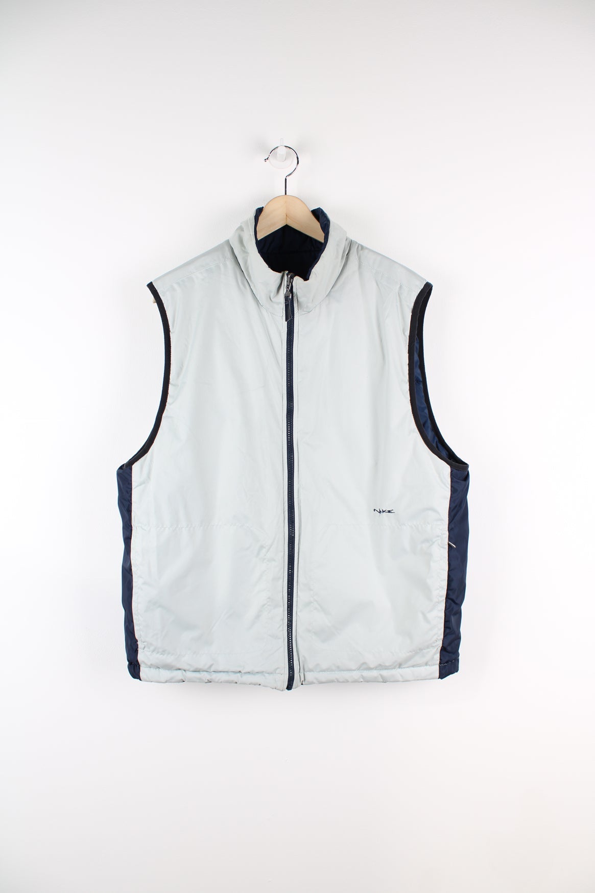 Vintage Nike reversible light puffer vest in blue and grey.