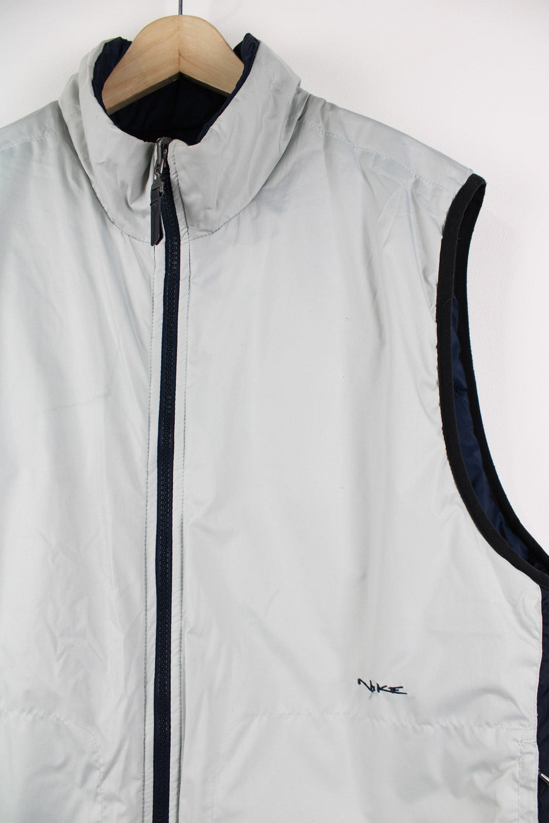 Vintage Nike reversible light puffer vest in blue and grey.