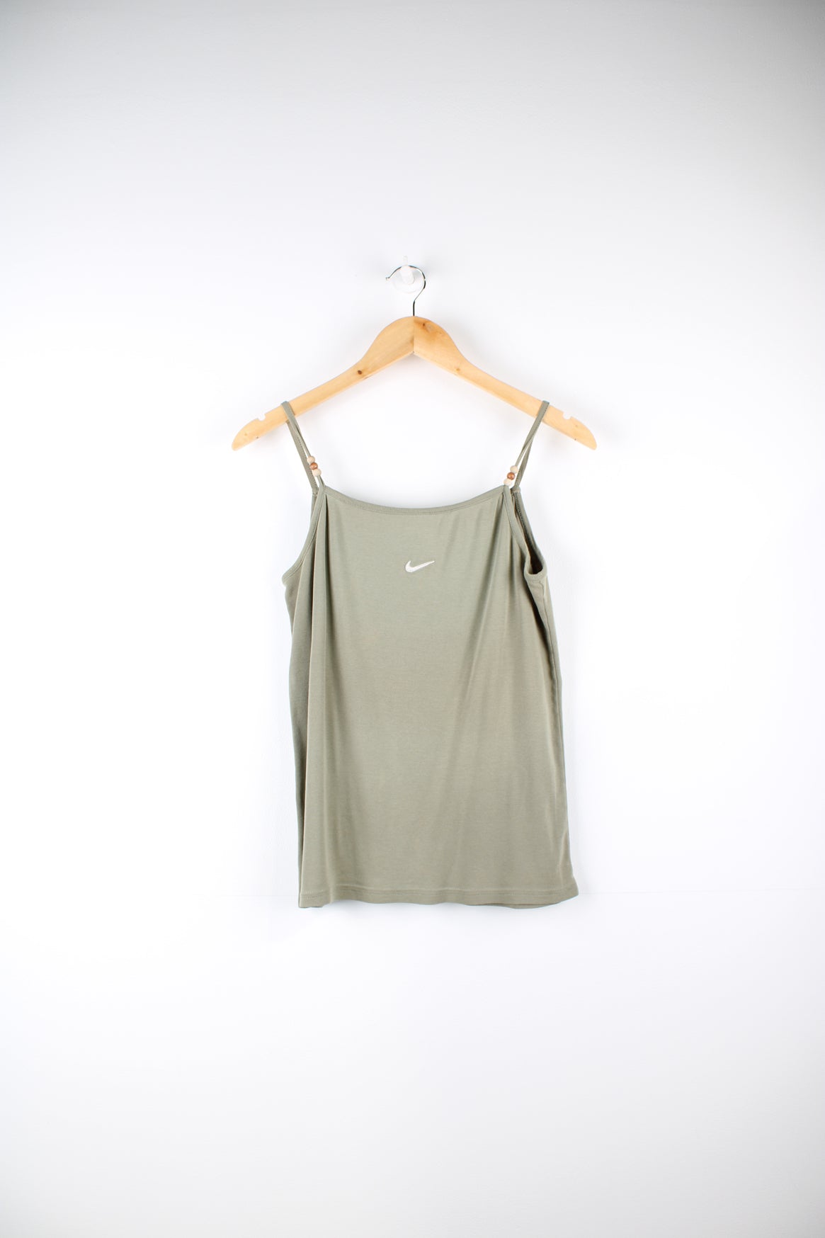 Nike cami top with embroidered logo on the chest and beads on each strap.