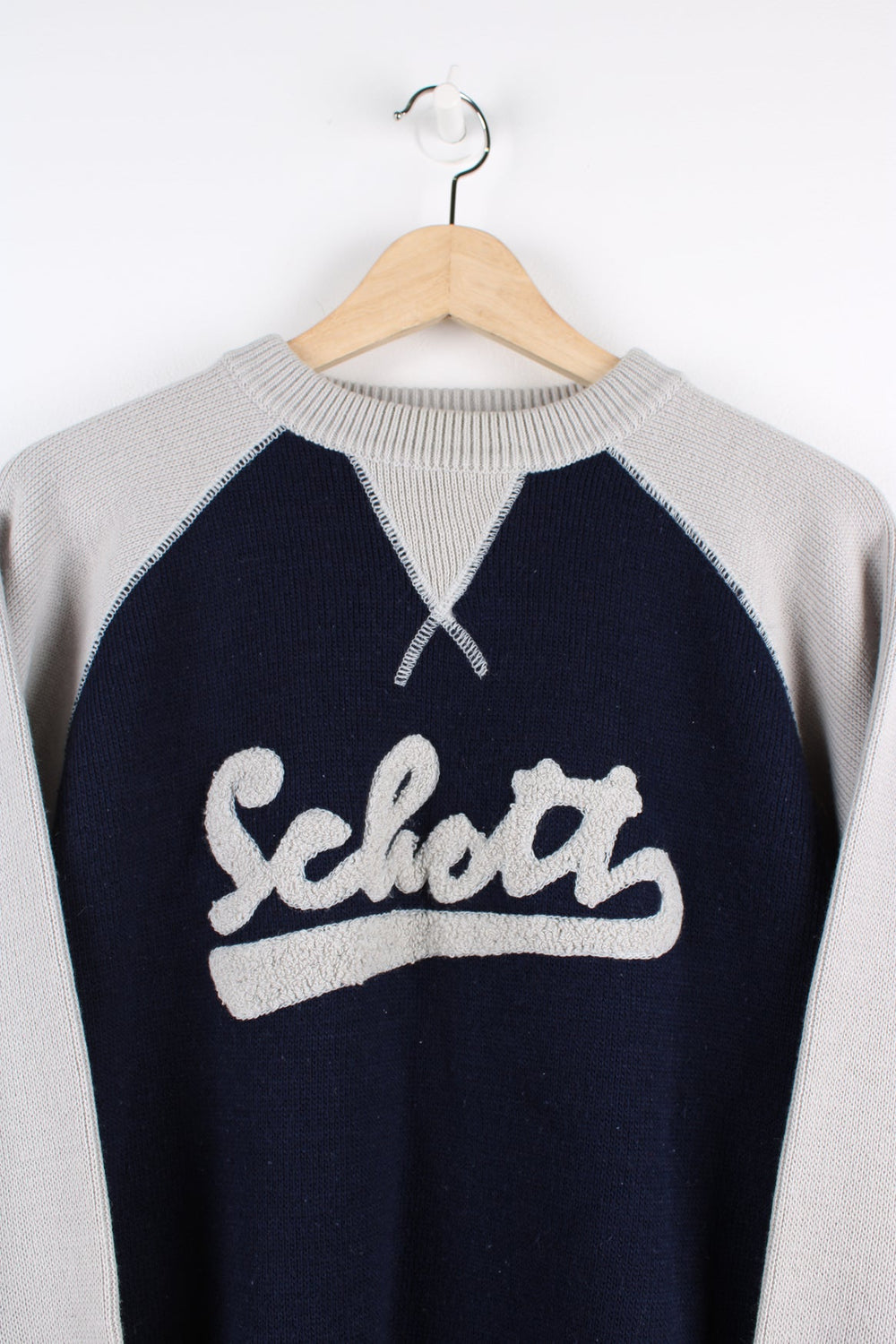 Schott blue and grey varsity style knitted jumper, features embroidered spell-out details across the chest