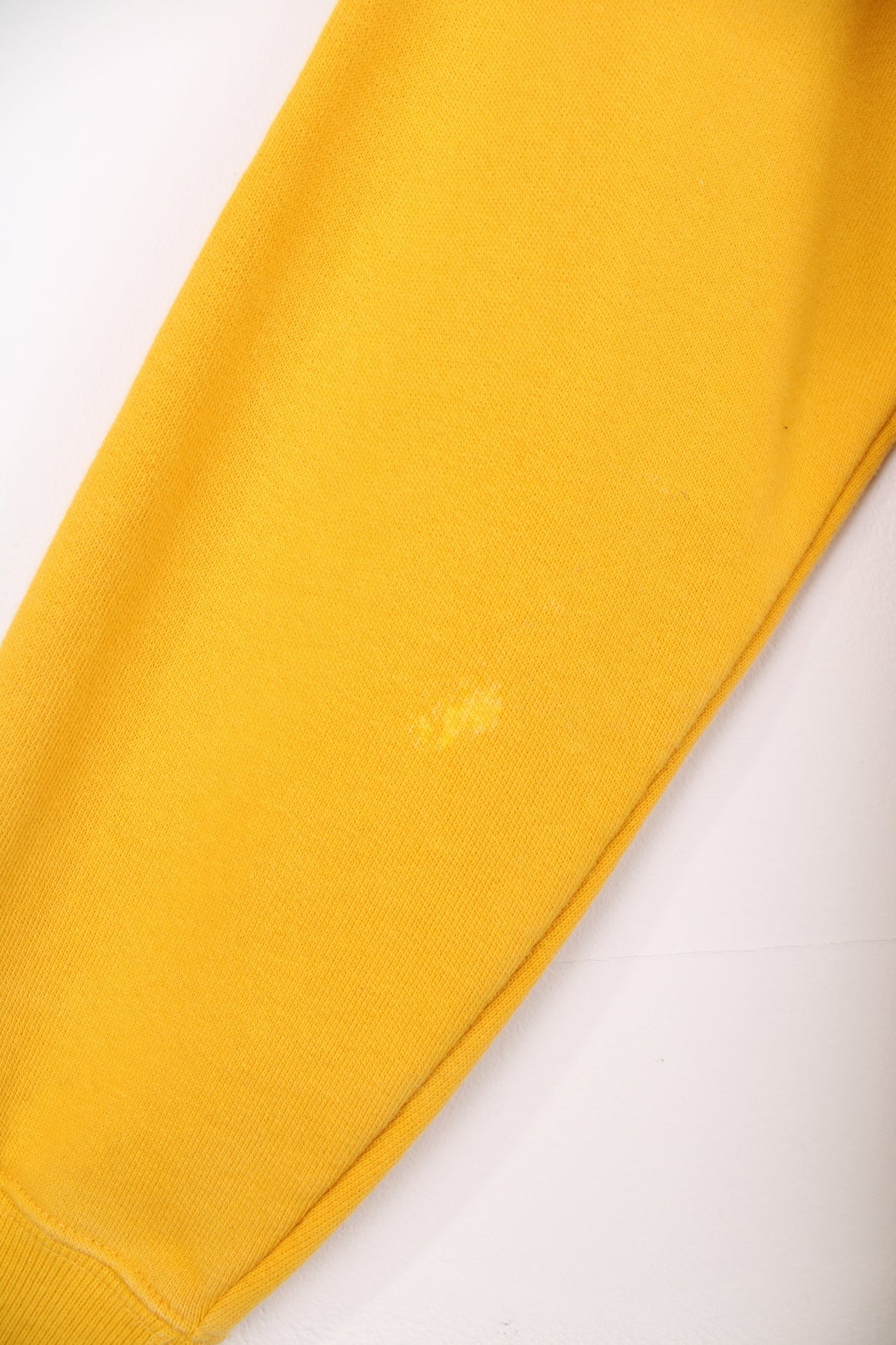 Champion Reverse Weave sweatshirt in yellow. Features embroidered logo on the chest.