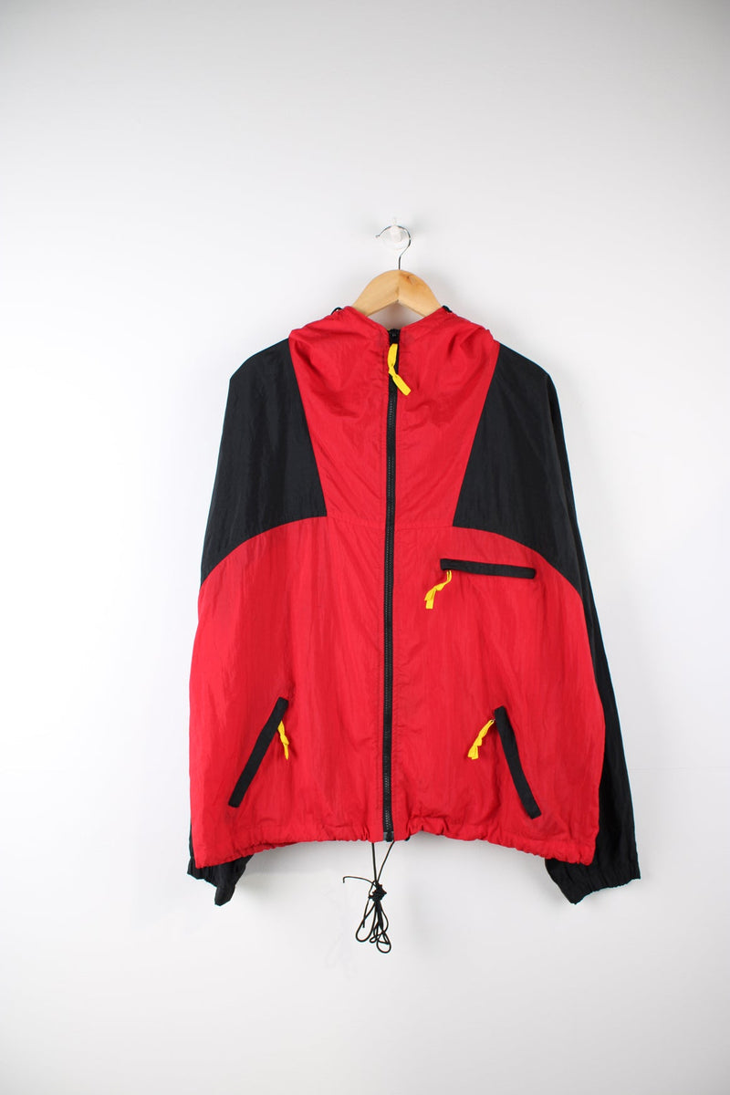 Vintage Marlboro Adventure Team zip through windbreaker jacket in red and black. Features embroidered logo on the sleeve and embroidered velcro badge on the back.