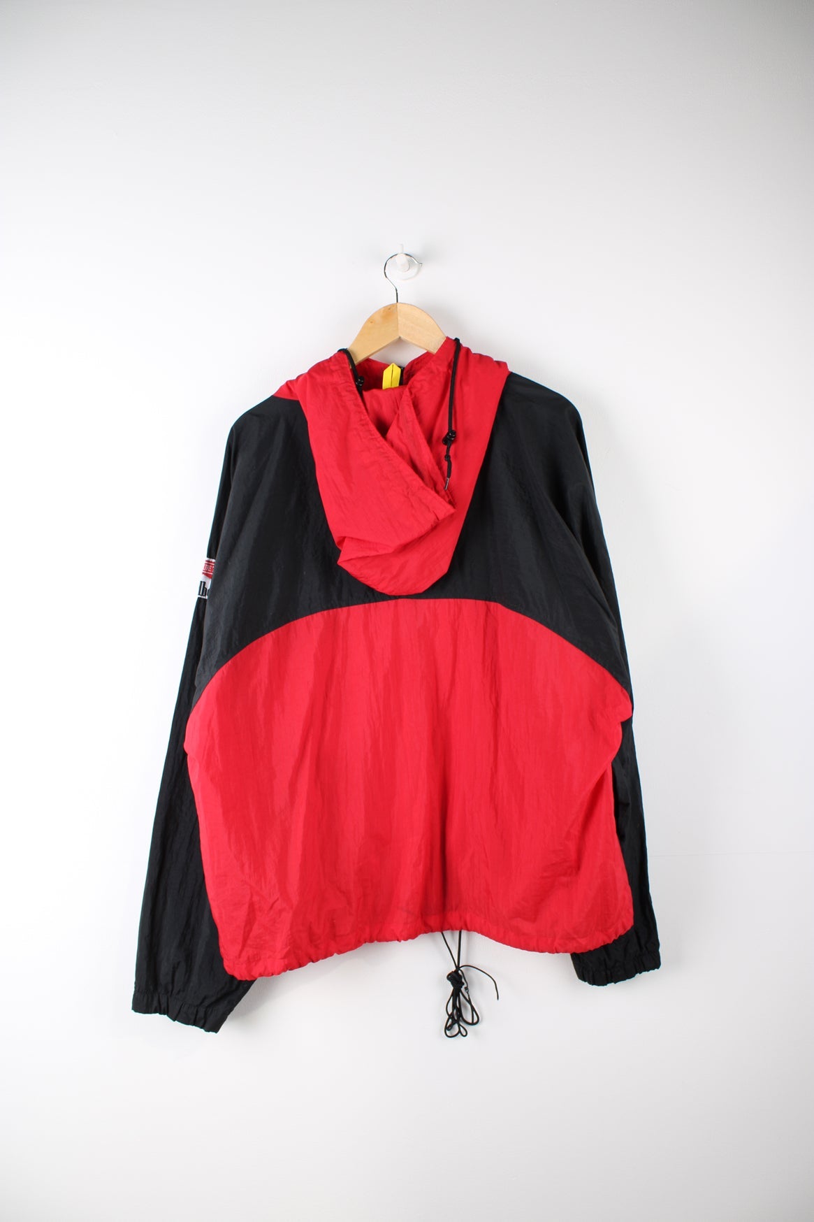 Vintage Marlboro Adventure Team zip through windbreaker jacket in red and black. Features embroidered logo on the sleeve and embroidered velcro badge on the back.