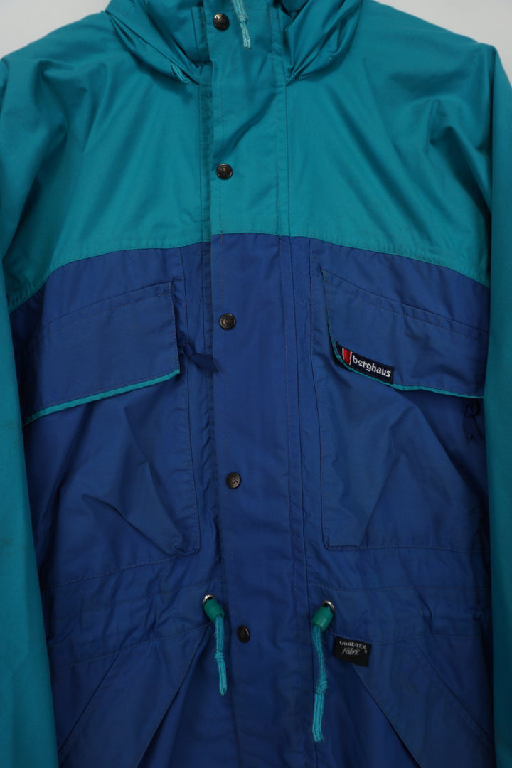 Vintage Berghaus Quattro GTX blue outdoor coat, features foldaway hood 