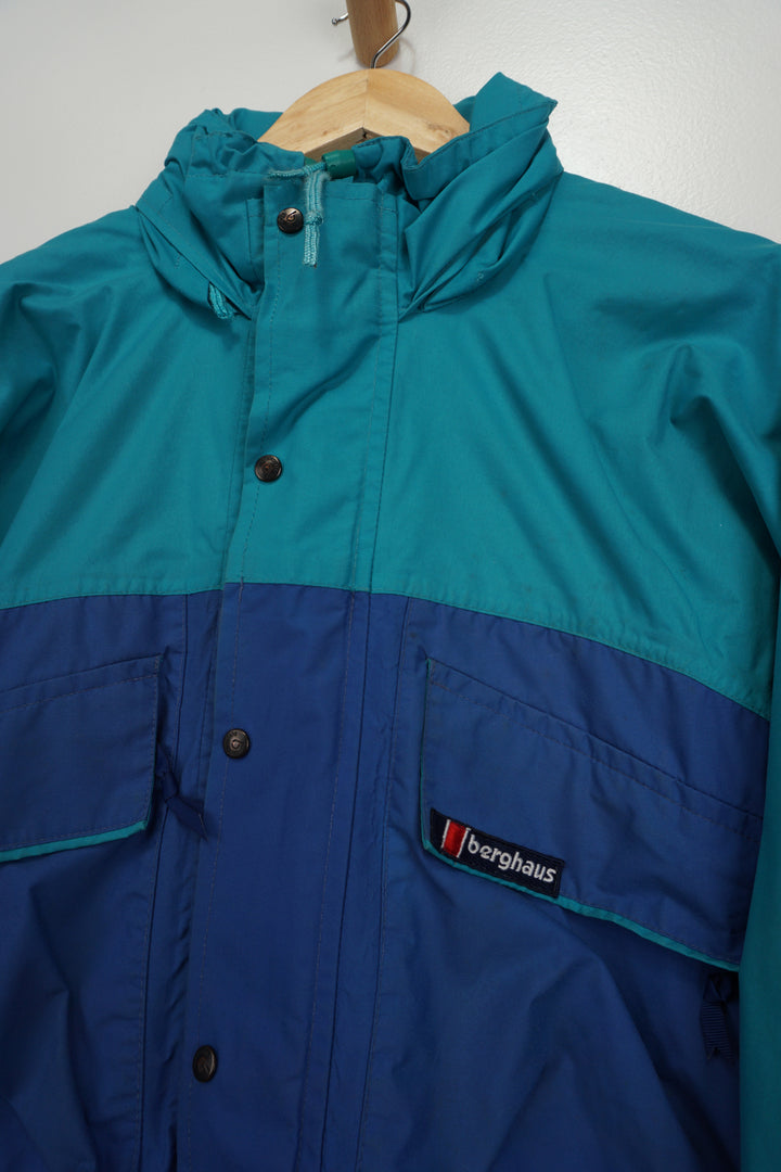 Vintage Berghaus Quattro GTX blue outdoor coat, features foldaway hood 